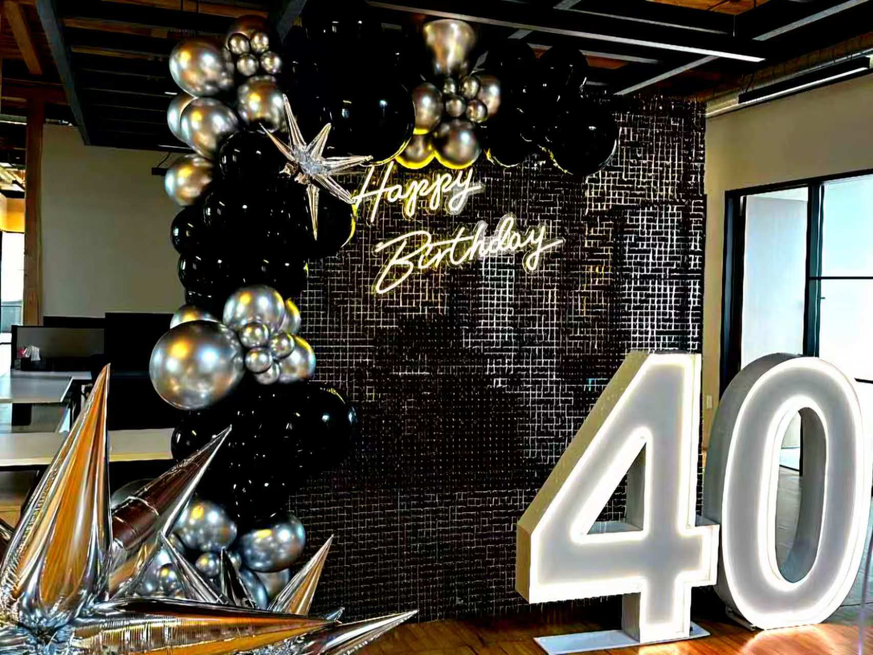40th birthday setup with shimmer wall, Happy Birthday neon and illuminated 40