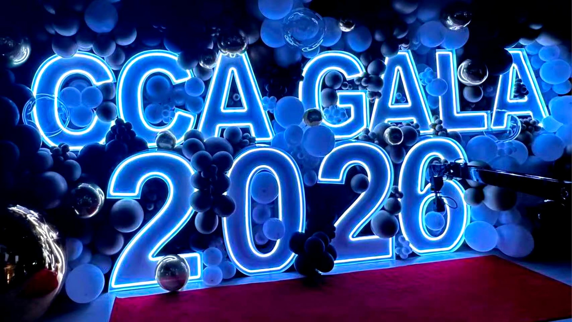 CCA Gala 2026 blue neon marquee letters