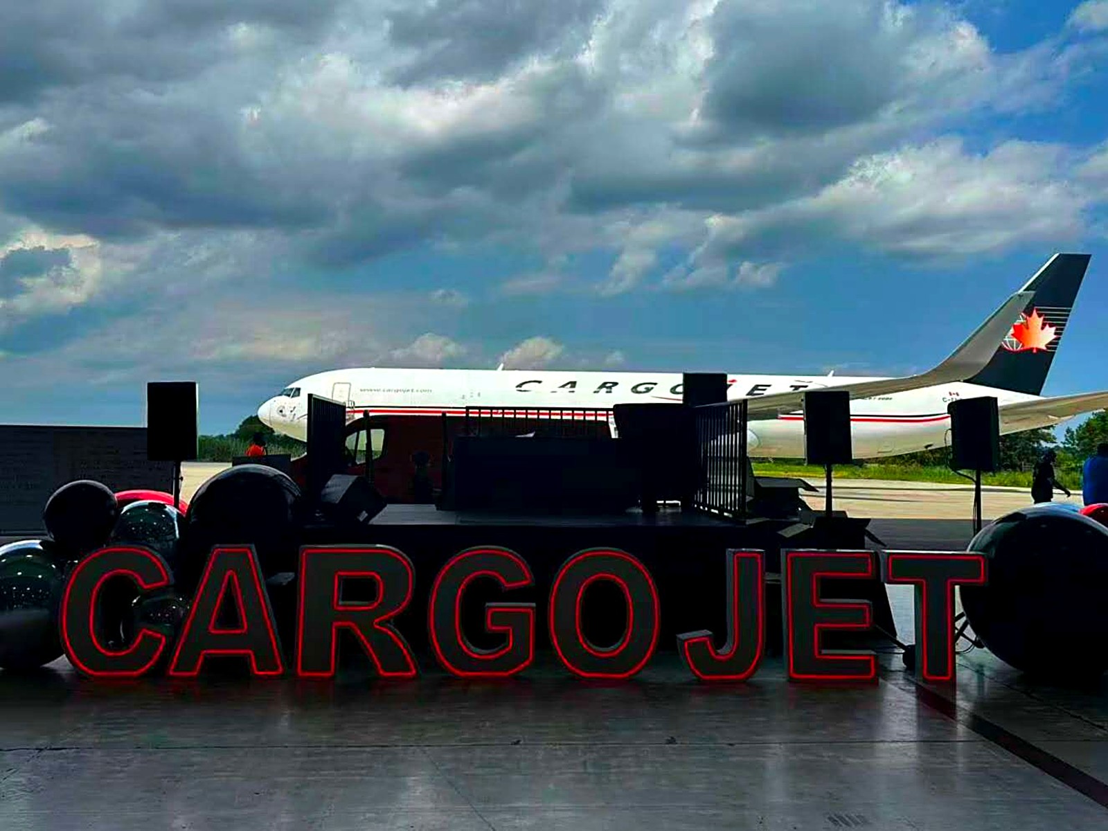 CARGOJET red neon marquee letters with airplane