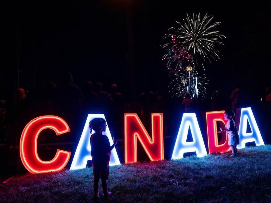 Neon CANADA letters with fireworks on Canada Day, Bronte Heritage Waterfront Park, Oakville